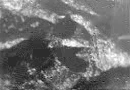 black and white image of titan's surface